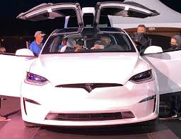 A tesla model s plaid erupted in flames as the owner was driving down the road on tuesday, attorneys for the man said, briefly trapping him in the car after the electronically activated doors would not open. Tesla Model X Plaid Makes An Appearance At Model S Plaid Delivery Event Laptrinhx News