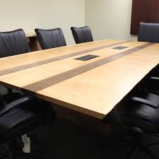 We are committed to bringing a high level of materiality and detail to staff level areas as well as the executive suite. Buy A Custom Conference Table Locally Or Online 4 500 Epoxy Logos Live Edge