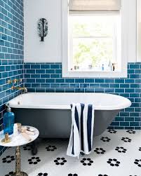 Black Bathtub With Blue Subway Tile In A Coastal Bathroom Blue Bathroom Tile Tile Bathroom Blue Subway Tile