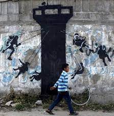 Banksy, who has a penchant for trenchant epigrams, opened the hotel, which directly to celebrate banksy's work in a newspaper column like this is to find the man's semantic fashions of expression. Banksy In Palestine A Look At The Street Artist S Work In Gaza And The West Bank The National