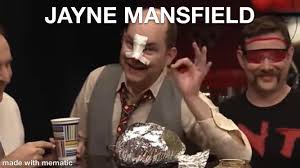 Can anyone explain to me why Mark points at the bag of popcorn while saying  “Jayne Mansfield”? (4th Annual Oscar Special). : rOnCinemaAtTheCinema