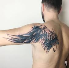 Wing On Guy S Shoulder Blade Upper Arm Best Tattoo Ideas Designs Shoulder Blade Tattoo Mens Shoulder Tattoo Wing Tattoo
