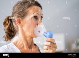 Pompa respiratoria per l'asma immagini e fotografie stock ad alta  risoluzione