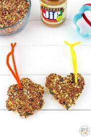 Easy Peanut Butter Bird Treats Kids Can Make Natural Beach Living Recipe Bird Treats Bird Seed Ornaments Recipe Easy Peanut Butter