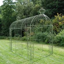 Plant supports for garden borders, specimen plants, and other ornamental settings should be as unobtrusive as possible so that they don't detract from the appearance of the plant. Garden Gazebos And Arches Garden Ornaments