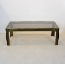Ultimately, i have a glass coffee table in mind for the living room, but when my sister texted me a photo of this brass chest at the rink, i jumped at the chance to go look at it. Peter Ghyczy Brass Glass Coffee Table 1970s 68857