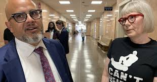 Wearing shirt that got her arrested at Trump rally, Buck faces trial