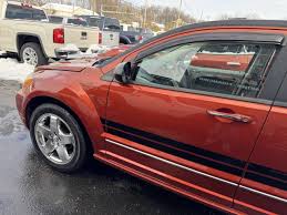 Image result for Sunburst Orange 2009 Caliber