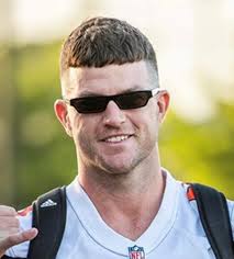 Describe Chad Townsend's haircut in one word…