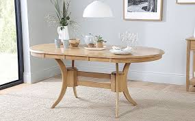 A traditional dining table set inspired by the farmhouse antique furniture look. Townhouse Oval Oak Extending Dining Table With 6 Regent Oatmeal Fabric Chairs Furniture And Choice