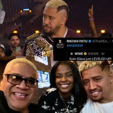 Rikishi congratulates Solo Sikoa after he won the WWE United States Title.