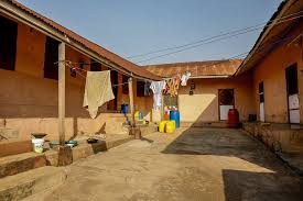 A camper van is a van which is equipped with beds and cooking equipment so that you can live, cook, and sleep in it. The Design History Of Ghana S Compound Houses Bloomberg
