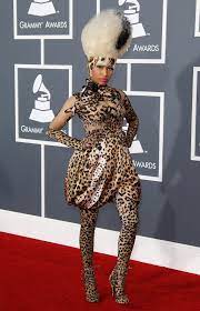 100 Of The Most Iconic Fashion Moments At The Grammy Awards All Right Here Grammy Fashion Celebrity Red Carpet Fashion