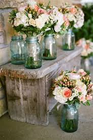 22 Creative Decorative Uses For Mason Jars Rustic Wedding Bouquet Wedding Centerpieces Wedding Flowers