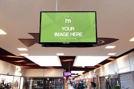 Public Tv Advertising Mockup Template A Big Lcd Tv Screen On A Shopping Center Mall Promote Your Message Mockup Template Window Display Design Tv Advertising
