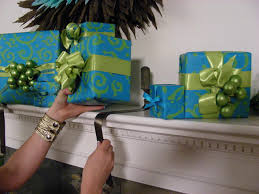 These best christmas stocking holders will add style to your mantel this holiday season. Wrapped Gift Stocking Holders Hgtv