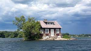 10 Delightful Houses On Their Own Tiny Islands Island House Small House Unusual Homes
