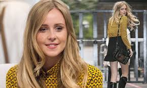 Diana Vickers in tiny skirt and knee high boots at ITV studios in London