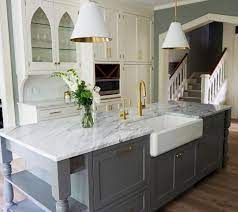 The cloud white kitchen island and perimeter cabinets blend seamlessly with the white subway tile backsplash, while the small area of wall painted in benjamin moore silver satin adds just the right amount of dimension to the space. Benjamin Moore Chelsea Gray Paint Color Schemes Grey Kitchen Furniture Grey Painted Kitchen Kitchen Cabinets Painted Grey
