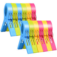 How to remove colour stains from white clothes using detergent. Uraqt Beach Towel Clips 12 Pcs Large Laundry Clip Clothes Pegs For Washing Line Bright Color Plastic Towel Pegs For Sunbeds Sun Loungers Pool Chairs Laundry Buy Online In Saint Vincent And