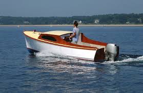 Sam Crocker S Small Outboard Skiff Is A 1950s Design A Modest Sized Outboard With A Small Cabin That Wil Cabin Cruiser Boat Small Power Boats Small Motor Boat