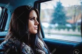Select from premium looking out car window of the highest quality. Sad Girl Looking Through Car Window Stock Photo Picture And Royalty Free Image Image 69652950