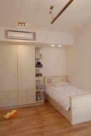 Designer Tips To Integrate Heat Pump And Air Conditioner Units With Existing Interior Design And Decor Small Bedroom Remodel Remodel Bedroom Guest Bedroom Remodel