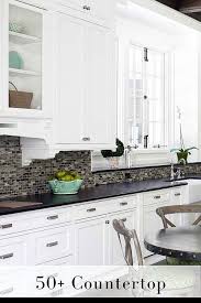 Modern kitchen countertops from unusual materials: 50 Black Countertop Backsplash Ideas Tile Designs Tips Advice