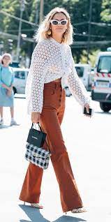 Whether in a neutral solid color or a bold pattern, pants with a wider leg are always a good idea. Camel Wide Leg Pants Howtowear Fashion