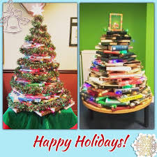 Better World Books On Instagram It S Beginning To Book A Lot Like Christmas In Our Offices Left Indiana Right Uk Books Christmas Book Tree Holiday