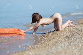 Naked Girl At The Sea. Young Woman Takes Out Of The Sea A Pool Raft. Stock  Photo, Picture and Royalty Free Image. Image 80352037.