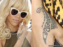 Rihanna started collecting tattoos in 2006 when her career started taking off and she she also has a star tattooed on the top inside of her left ear. Rihanna S Tattoos Meanings Steal Her Style