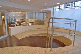 Like The Curved Lines Of This Wheelchair Ramp In A Commercial Office Building Wheelchairramp Disabilityliving Ramp Design Ramps Architecture Wheelchair Ramp