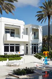 Maybe you would like to learn more about one of these? Exterior Tommy Hilfiger S Golden Beach House In Miami Designed By Martyn Lawrence Bullard Miami Houses Beach House Plans House