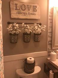 You can hold all of your essentials, like lotion, cotton balls and tweezers. 38 Beautiful Bathroom Wall Decor Ideas That Add Modern Flare Half Bathroom Decor Small Bathroom Decor Farmhouse Bathroom Decor