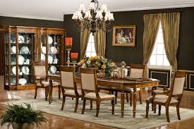 Dining room table shown with and without leaves. Tuscany Dining Table Orleans International