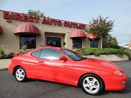 Image result for Wildberry Red 1999 Tiburon