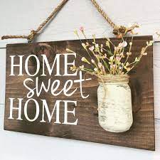 When we are decorating our homes, we prioritize the parts of the home that are less private and are appreciated why is wall art important? Home Sweet Home Sign With Mason Jar Vase Homebnc