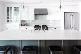 Home to any budget, home to any possibility. White And Gray Kitchen With Heather Gray Subway Tiles Transitional Kitchen