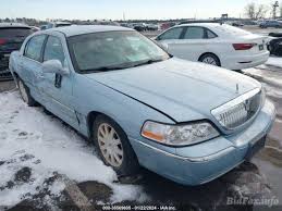 Image result for Light Ice Blue 2005 Town Car