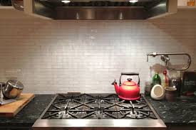 to clean greasy backsplash behind stove