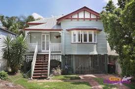 A vision for the next 30 years. Humble Queenslander Cottage Gets Dramatic Hamptons Style Makeover
