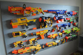 Cheese ball container turned nerf dart storage (great for keeping them all in one place! Nerf Storage Ideas Shefalitayal