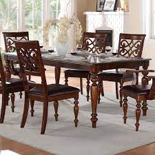 If purchasing a complete set, the cost to furnish a dining room will range from around $7,000 to $15,000. Homelegance Creswell Traditional Formal Dining Table With Turned Legs And Solid Wood Tabletop Value City Furniture Dining Tables