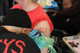 Robin's style focuses on cover ups and illustrative tattoos. What Do Tattoo Artists Think About D C Flag Tattoos Dcist
