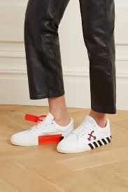 Blanc Baskets En Toile Arrow Off White Blanc Baskets En Toile Arrow Off White Net A Porter Source By Lucianaol Sneakers Balenciaga Tote White Sneakers