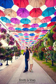 How To Use Umbrellas For Wedding Decor In A Fun Quirky And Chic Way Umbrella Wedding Decorations Umbrella Wedding Umbrella Decorations