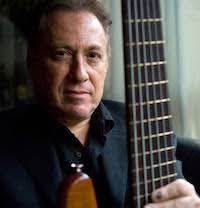 The Latin Bass Book: A Practical Guide by Oscar Stagnaro and Chuck Sher