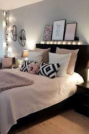 In this airy retreat, walls and trim dress in varying shades of white, as do curtains, bedding, upholstery, and even the dresser. Small Bedroom Remodel Ideas For Minimalists Bedroom Ideas For Small Rooms Women Small Room Bedroom Woman Bedroom