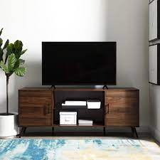 Tate walnut 64.5 media console with 2 wide bookcases $2,197.00. Walker Edison Furniture Company 60 In Dark Walnut Composite Tv Stand 69 In With Doors Hd60nor2ddw The Home Depot